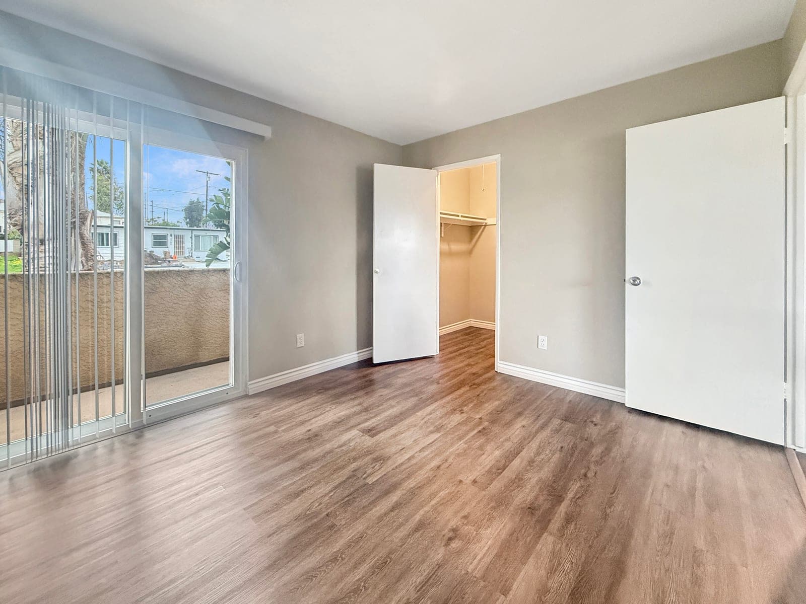 Bedroom with sliding glass door to patio